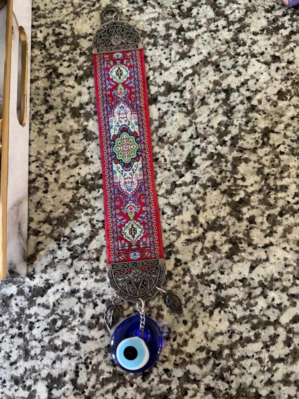 Red Patterned Ribbon Wall Hanging with Blue Evil Eye Charm